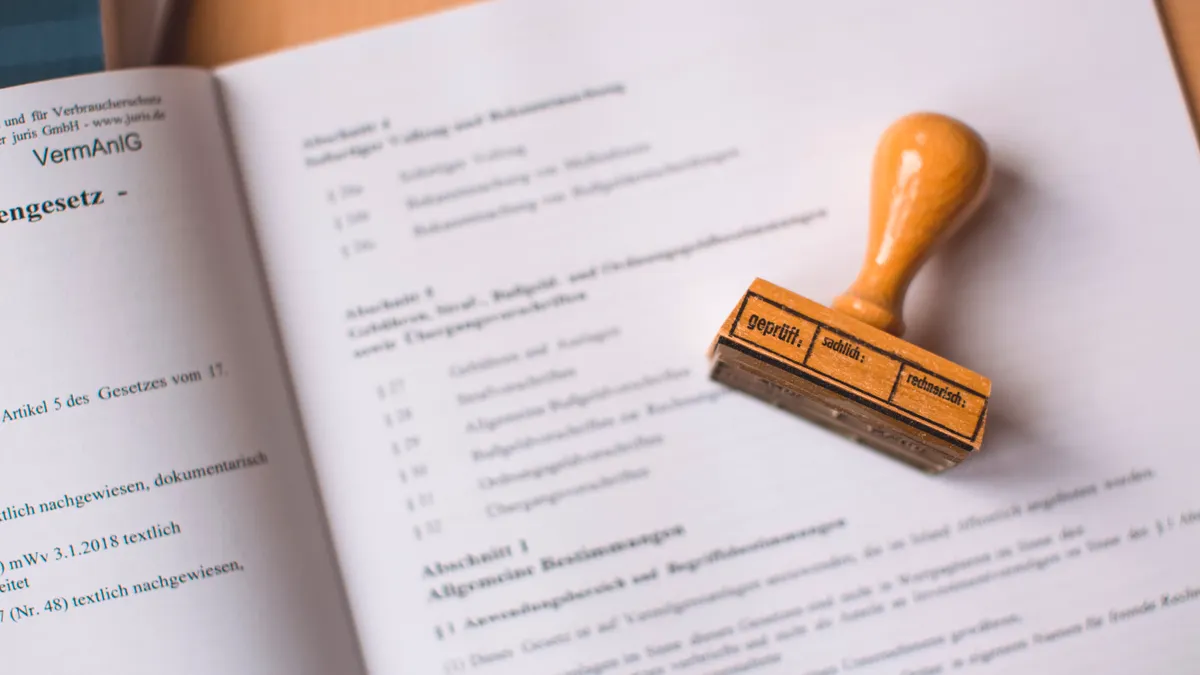 Rubber approval stamp on a document